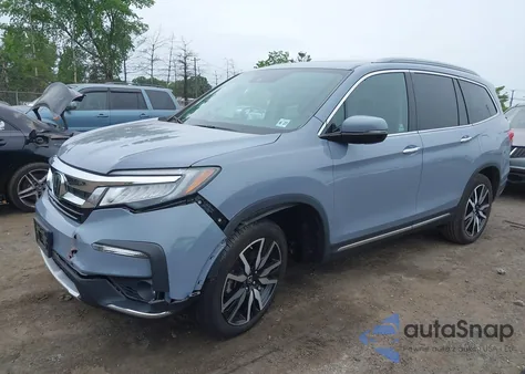 2022 Honda Pilot Touring z USA, uszkodzony, nr VIN 5FNYF6H68NB056077